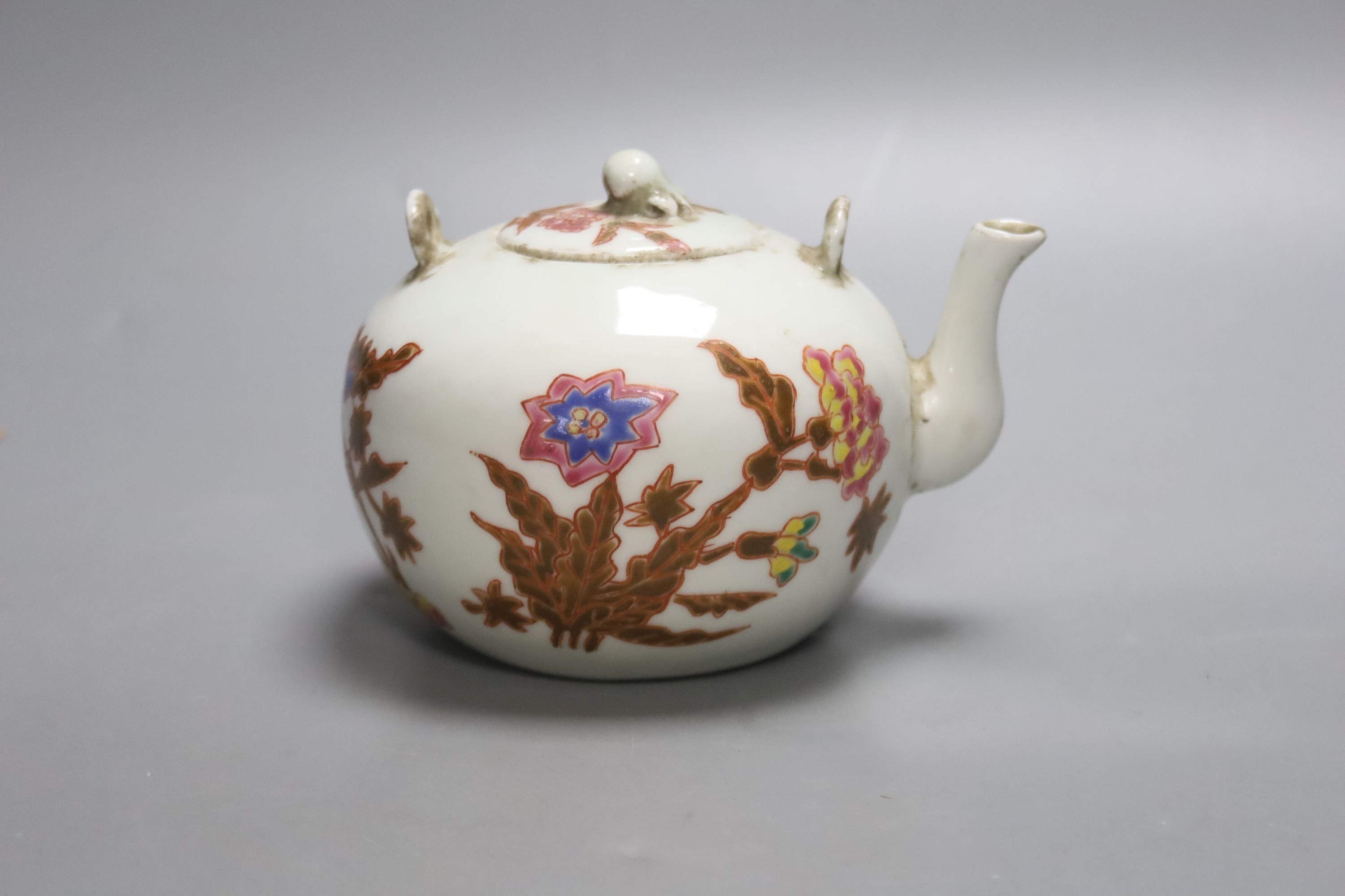 A small Chinese enamelled teapot, with cover, height 9cm